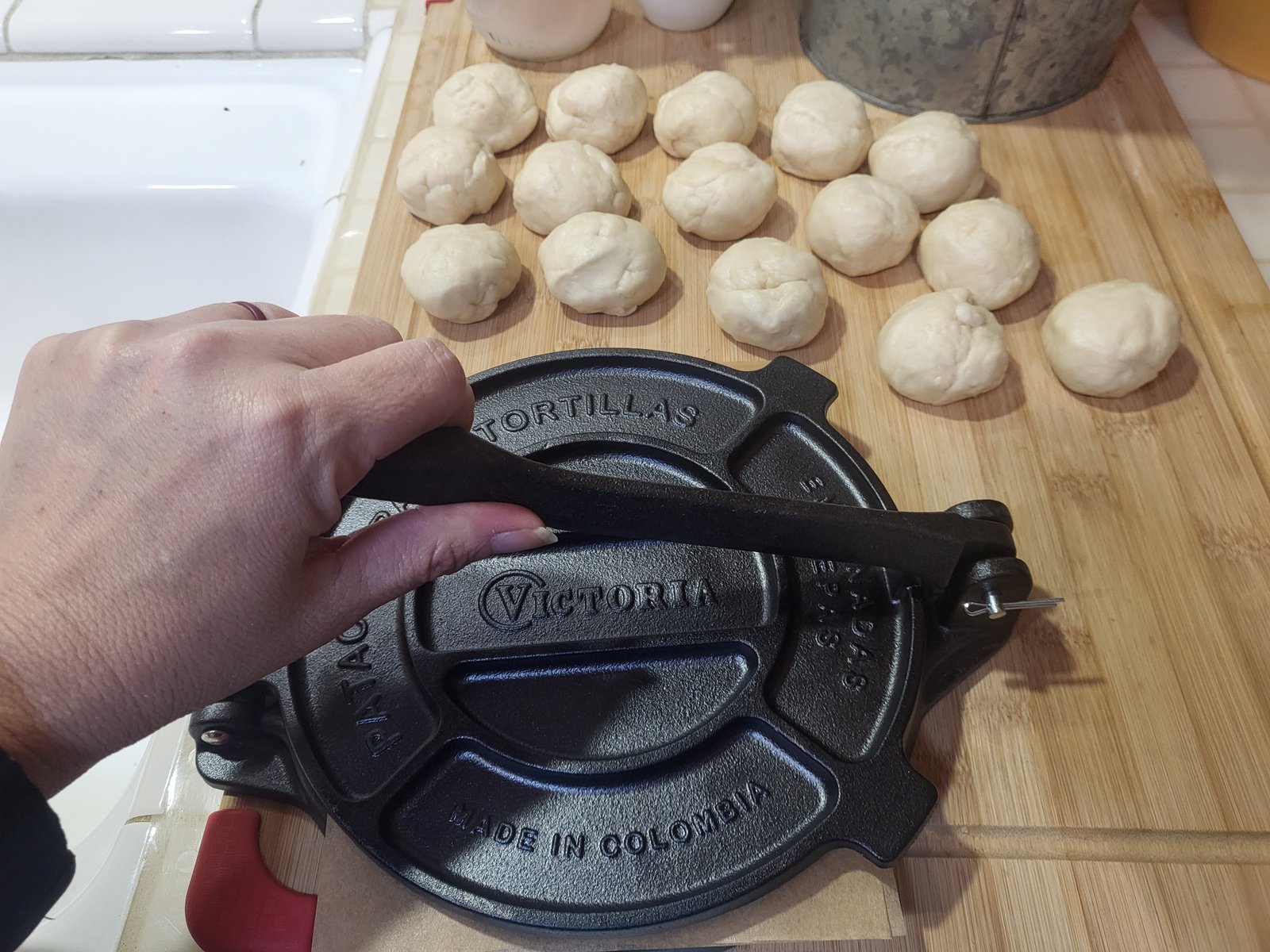 tortilla press being used